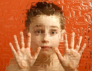 Autism and sleep disorders autism child behind screen1 300x230 Autism and Insomnia Melatonin Improves Kids Sleep Disorders